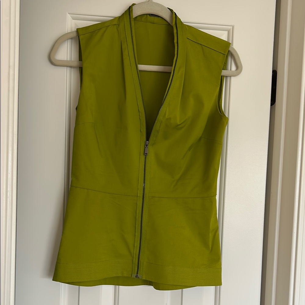 Sleeveless Green Zip-Up shirt, size XS very elegant on .